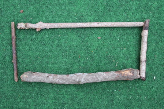 rectangle made with two long sticks and two short sticks