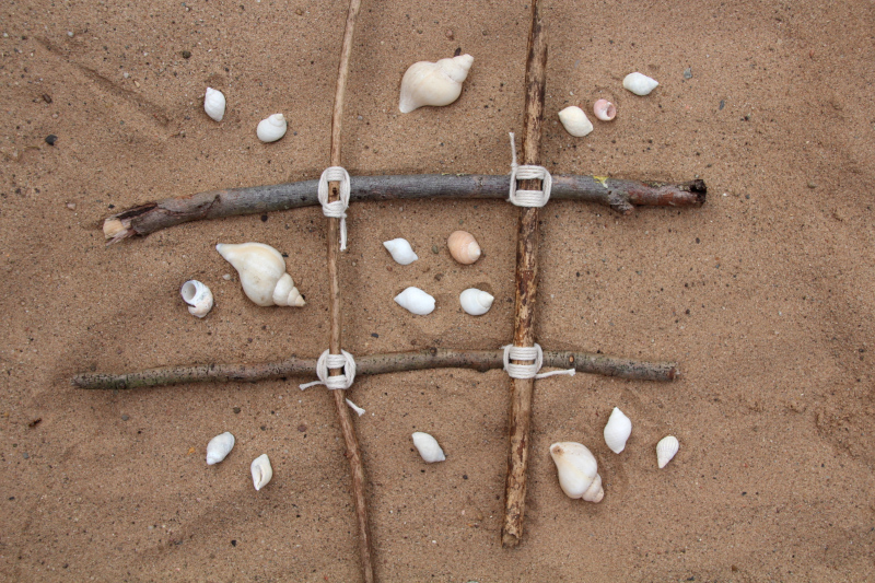 add to fifteen game played with grid made of sticks and shells represent